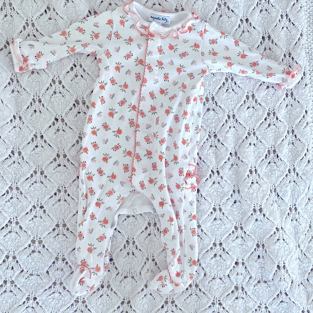 Magnolia Baby Onesie with sweet orange and pink flowers. 3M